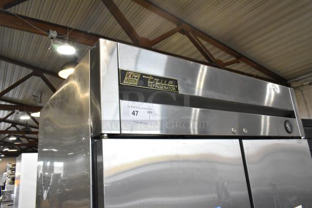 2016 True T-35 stainless steel commercial 2-door reach-in cooler with poly-coated racks, on casters, 115V, 1 phase.