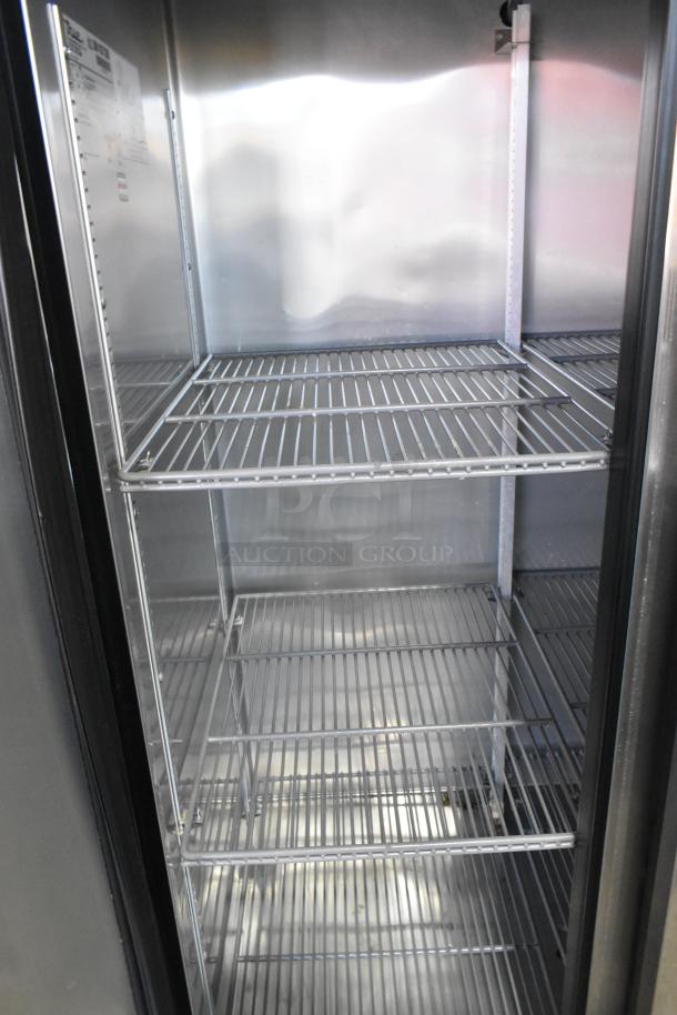 2016 True T-35 stainless steel 2-door reach-in cooler with poly-coated racks and commercial casters, 115V, 1 phase.