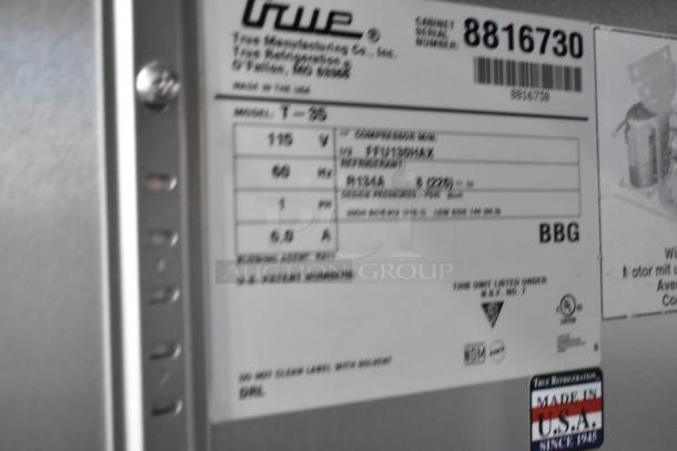 2016 True T-35 stainless steel commercial cooler label showing model, voltage, and manufacturing details. Made in USA.