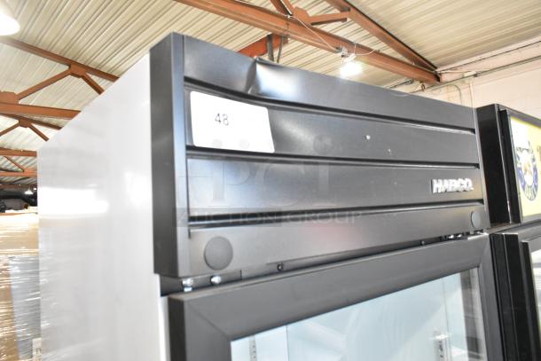2019 Habco SE18 metal single-door cooler with poly-coated racks. Features 115 volts, 1 phase. Minor dent visible.