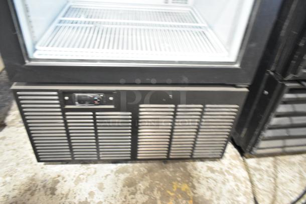 2019 Habco SE18 single door reach-in cooler, poly-coated racks, metal body, 115 volts, 1 phase, excellent condition.