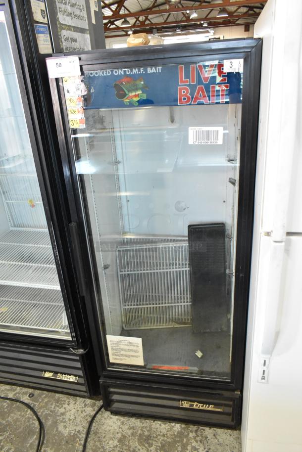 True GDM-12 single door cooler merchandiser, metal frame, poly coated racks, 115 volts, commercial use, shows wear.