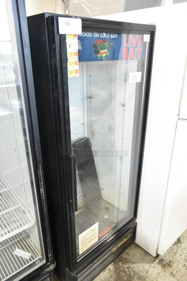 True GDM-12 metal commercial cooler with single glass door, poly coated racks, and bait signage. 115 volts, 1 phase.