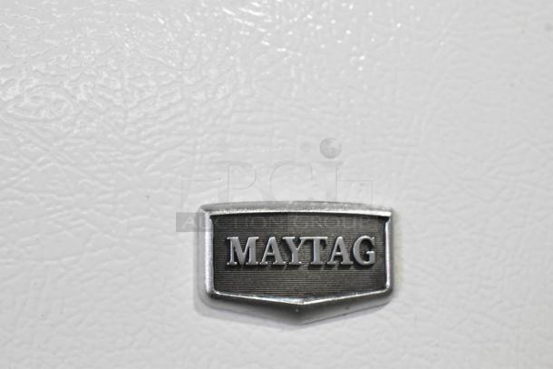 Maytag M1TXEGMYW01 metal reach-in cooler with freezer, 115V, 1 Phase, features Maytag logo on white textured surface.