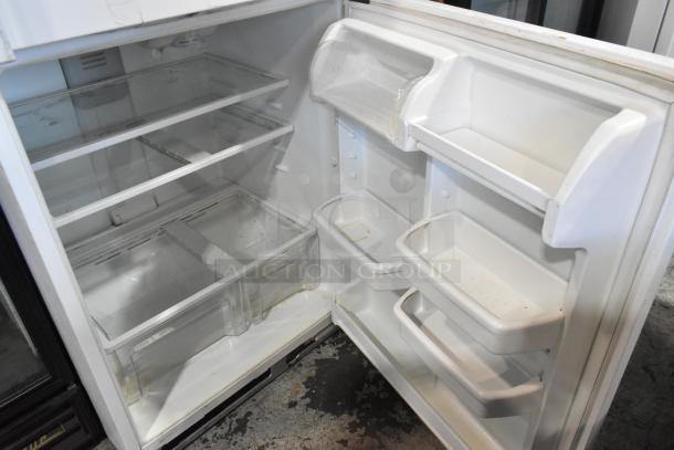 Maytag M1TXEGMYW01 reach-in cooler with freezer, 115V, 1 phase, metal exterior, shelves and door storage visible, used condition.