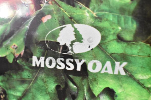 Mossy Oak logo on green leaf background, likely from BD-180U-MSOK Single Door Reach In Freezer. Model details not shown.