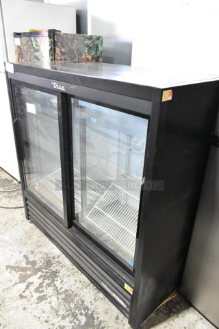 2019 True GDM-41SL-48-HC-LD 2-door reach-in cooler with poly-coated racks, black exterior, and clear glass doors.