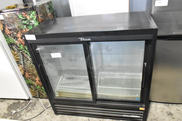 2019 True GDM-41SL-48-HC-LD 2-door cooler merchandiser, black metal, poly coated racks, 115V, 1 phase, clean exterior.