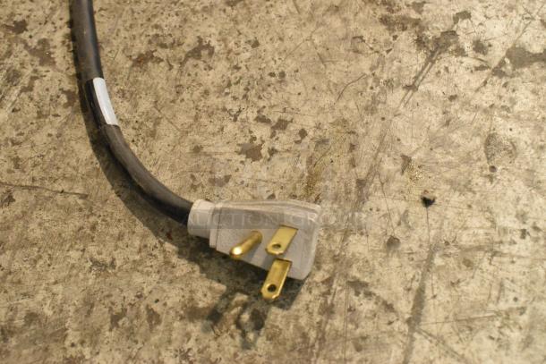 The image shows a power cord with a three-prong plug, suitable for the True GDM-41SL-48-HC-LD cooler.