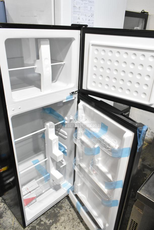 Frigidaire Gallery FGFR727-6COM stainless steel cooler w/ freezer, 115V, 1 phase, new, shelves and door storage visible.