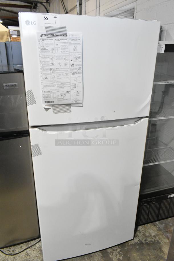 LG LTCS20020W/05 cooler with freezer, 115 Volts, 1 Phase. White finish, taped instruction label. Visible in excellent condition.
