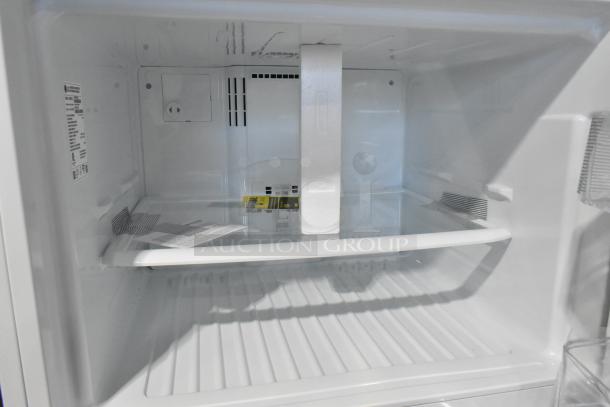LG LTCS20020W/05 reach-in cooler with freezer, 115 Volts, 1 Phase, pristine condition, interior view with shelving.