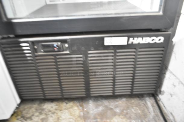 Habco SE12 commercial cooler, metal single door, poly coated racks, 115V, 1 phase. Visible Habco logo and control panel.