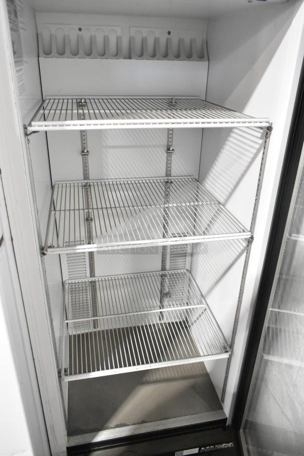 Habco SE12 metal commercial single-door reach-in cooler merchandiser with poly-coated racks, excellent condition.