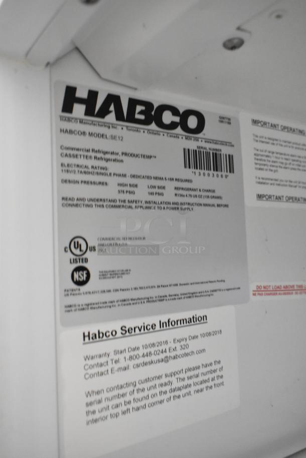 Habco SE12 commercial cooler label showing model info, electrical rating, and certifications; includes service contact details.