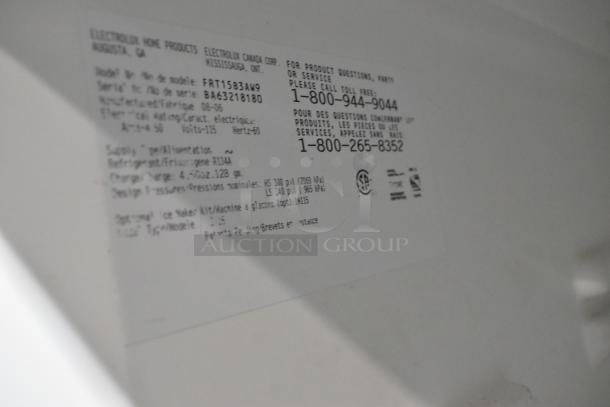 Electrolux FRT15B3AW9 cooler label, showing model and serial number. 115V, 1-phase unit. Clean and well-preserved.