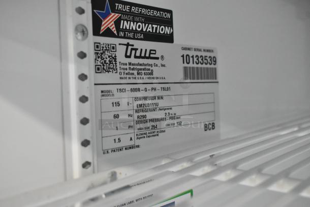 2021 True TSCI-600R-G-PH single door cooler with poly coated racks, model label showing specs and serial number 10133539.
