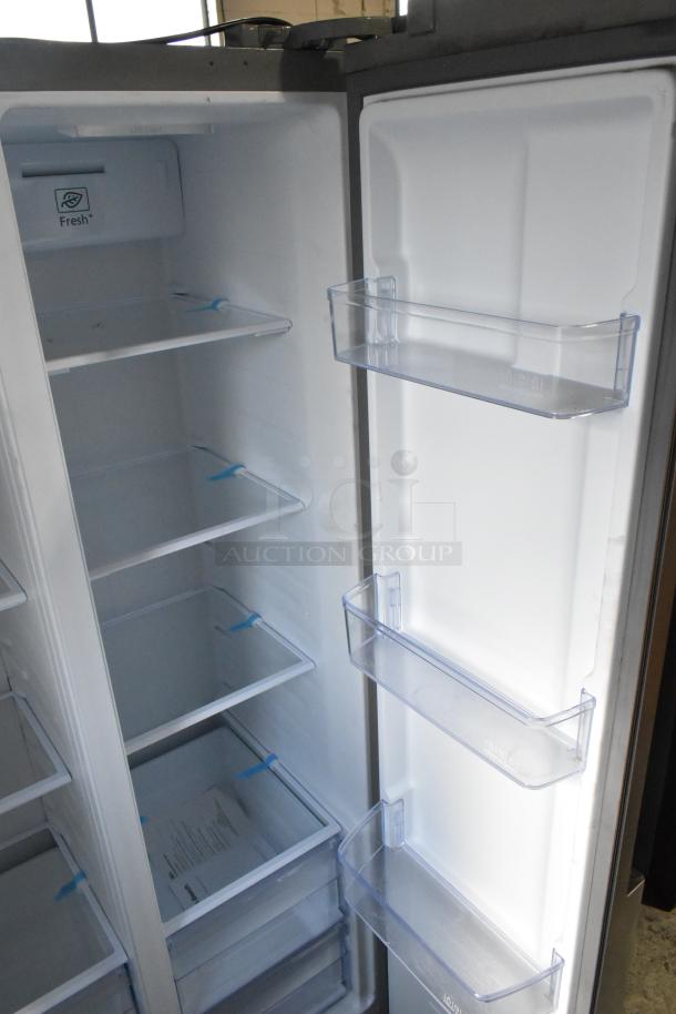 Hamilton Beach HBF1558/HZ8551 stainless steel reach-in cooler with freezer, 115 volts, 1 phase, interior shelves and door bins.