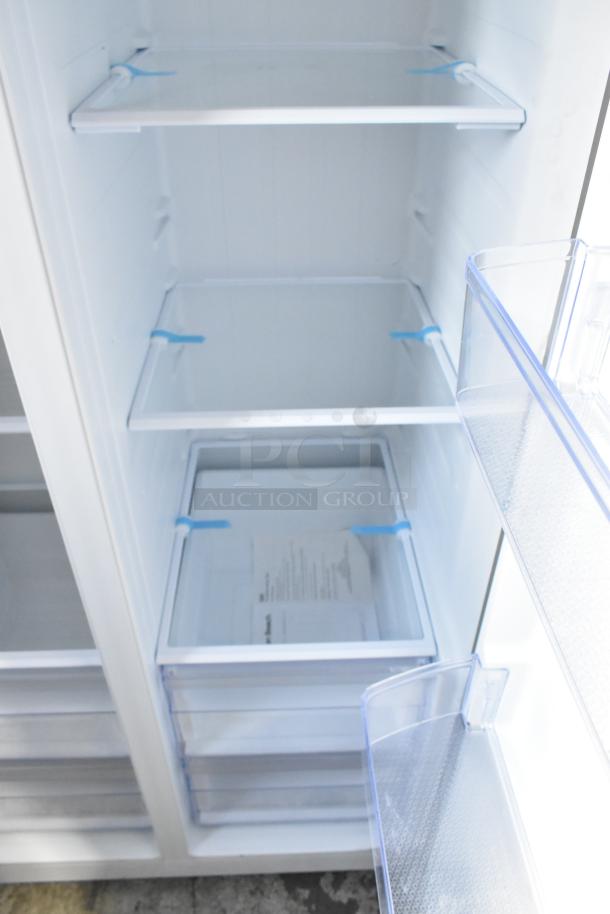 Hamilton Beach HBF1558/HZ8551 cooler, stainless steel, interior view with shelves, 115V, 1 phase, clean condition.
