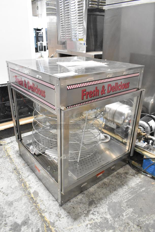 Brand new Benchmark USA 51018 humidified rotating pizza/pretzel warmer with pretzel and 18" pizza racks. Scratch and dent.