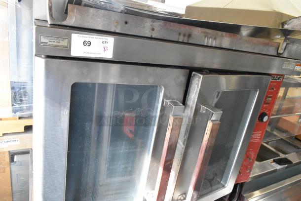 Vulcan VC4GD stainless steel convection oven with view-through doors, metal racks, and thermostatic controls.