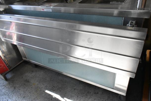 Piper Products 730301 stainless steel 3-bay steam table with sneeze guard and tray slide, 208 volts, 1 phase.