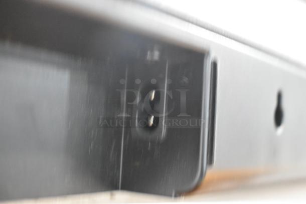Sony HT-S100F Sound Bar port close-up, showing power input. Black finish, designed for 120 Volt, 1 Phase use. Good condition.
