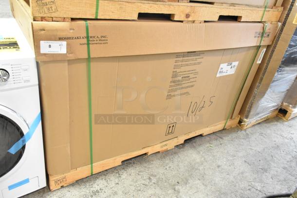 Hoshizaki CC65 bottle cooler, brand new in box, with 2 sliding lids. Box labeled with model, serial, and handling instructions.