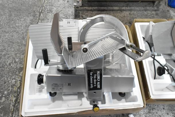 Bizerba SE 12 US commercial meat slicer, metal, 120 Volts, 1 Phase, includes allergy alert label; excellent condition.