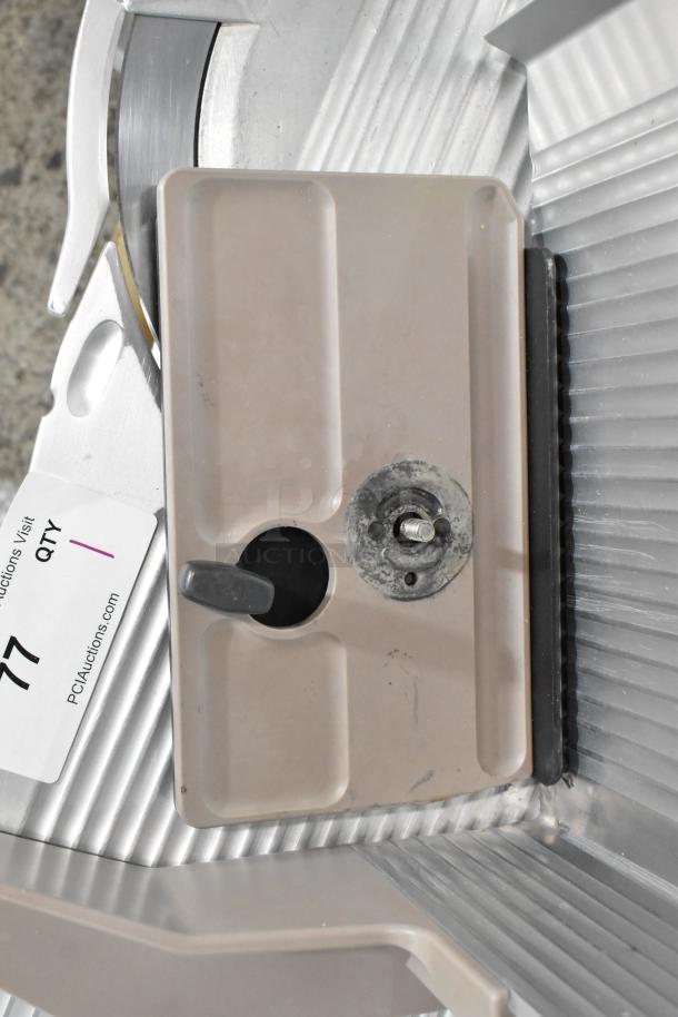 Bizerba SE 12 US meat slicer, metal, 120 volts, 1 phase, commercial countertop model. Visible wear on components.
