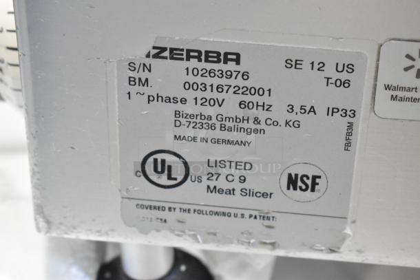 Bizerba SE 12 US meat slicer label showing serial number, 120 volts, 1 phase, UL and NSF certifications, made in Germany.