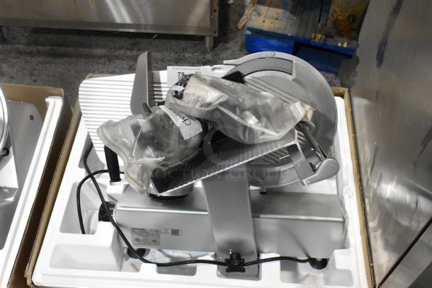 Bizerba SE 12 US commercial meat slicer with blade sharpener, 120V, 1 phase, in good condition.