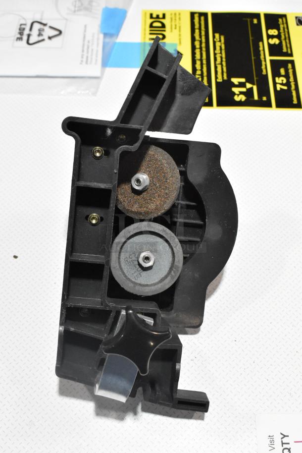 Bizerba SE 12 US meat slicer blade sharpener attachment, black plastic housing with two grinding wheels, used condition.
