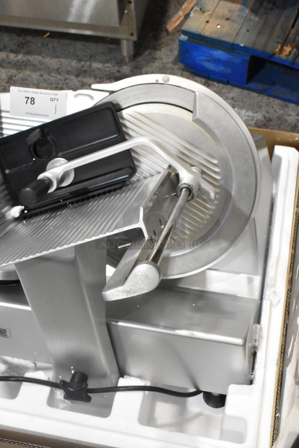 Bizerba SE 12 US commercial meat slicer with blade sharpener, metal construction, 120V, 1 phase, excellent condition.