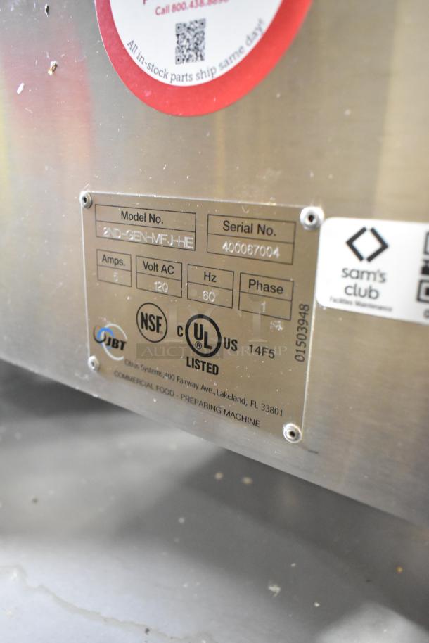 JBT 2ND-GEN-MFJ-HE stainless steel commercial citrus juicer, 120V, 1 phase, NSF and UL listed, model plate shown.