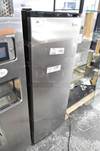 Frigidaire EFRF698-6COM stainless steel single door reach-in freezer, 115 volts, 1 phase, with visible scuffs and tags.