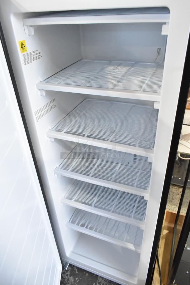 Frigidaire EFRF698-6COM stainless steel single door reach-in freezer, 115V, 1 phase, with five wire shelves.