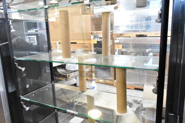 Metal and glass dry display case, features multiple shelves, broken glass visible, suitable for interior showcasing.