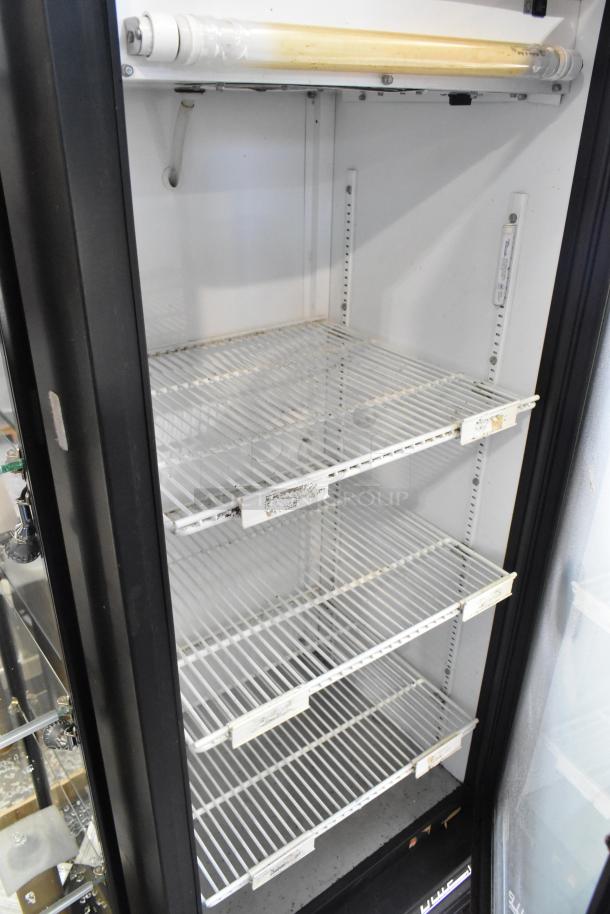 True GDM-12 commercial single door cooler, metal build, poly-coated racks, 115 volts, 1 phase, excellent condition.