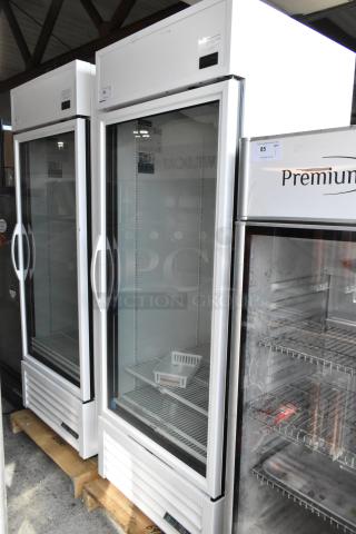 2021 True TSCI-600R-G-PH single door reach-in cooler, metal body, poly coated racks, 115V, excellent condition.