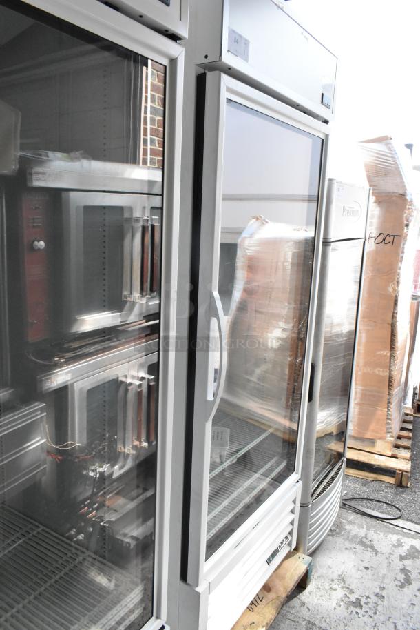 2021 True TSCI-600R-G-PH metal single door cooler merchandiser with poly racks, 115V, excellent condition.