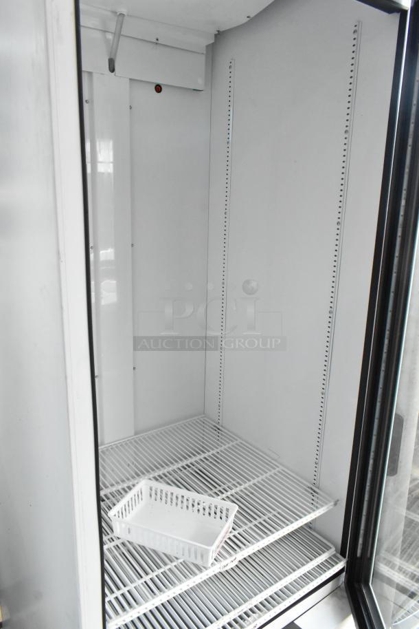 2021 True TSCI-600R-G-PH commercial cooler, single door, metal, poly-coated racks, 115V, 1 phase, excellent condition.