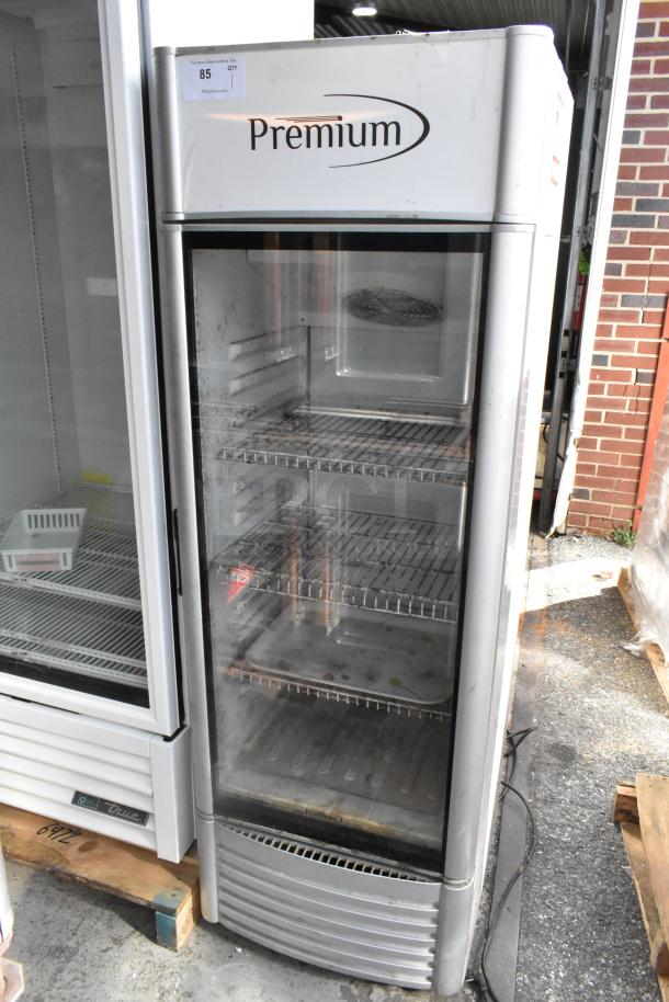 Premium PRF90DX metal single door cooler, visible wear, with poly coated racks. 115V, 1 phase. Premium branding on top.
