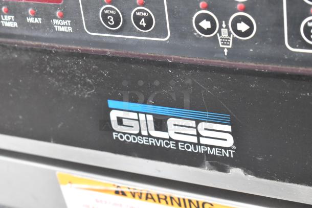 Giles EOF-24 stainless steel commercial electric fryer, 3 bays, center dumping station, 480V, 3 phase, on casters.