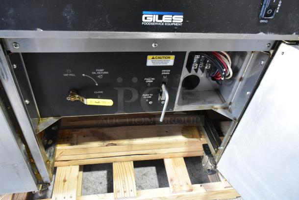 Giles EOF-24 stainless steel electric 3-bay deep fryer with center dump station on casters. 480V, 3-phase. Signs of use.