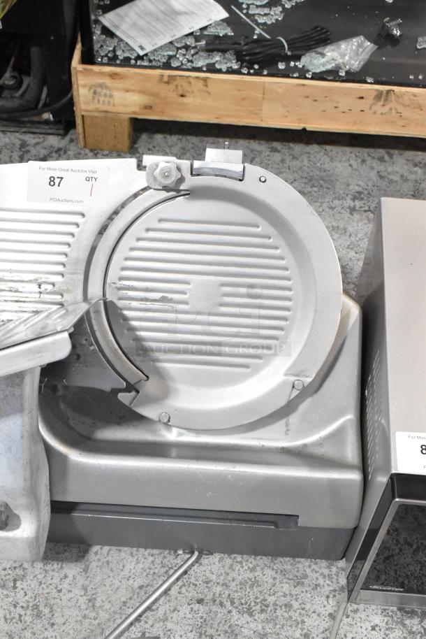 Hobart 2912 stainless steel commercial countertop meat slicer, shown in good condition with visible markings and electrical cord.