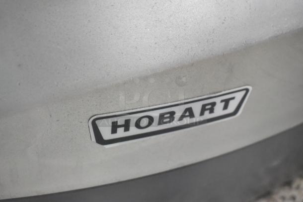 Hobart 2912 Stainless Steel Commercial Meat Slicer, 115V, 1 Phase, logo detail shown, excellent condition.