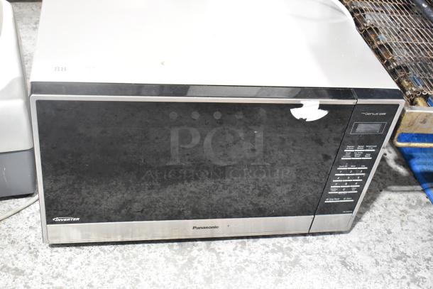 Panasonic NN-SN975S metal countertop microwave oven, 120 volts, with digital keypad and inverter technology.