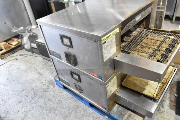 Two Middleby Marshall DZ33T CTX stainless steel conveyor pizza ovens. Electric, 208/240V, 1 phase. Used condition.