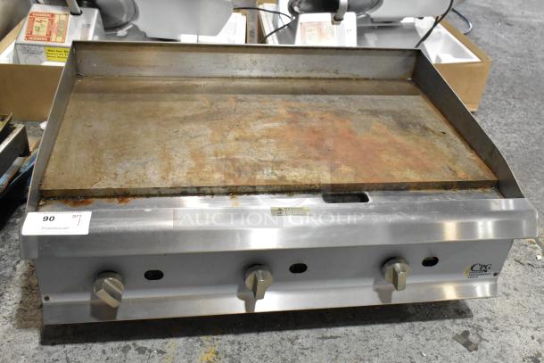 Cooking Performance Group CPG 351GMCPG36 stainless steel flat top griddle. Natural gas, 90,000 BTU, well-used condition.